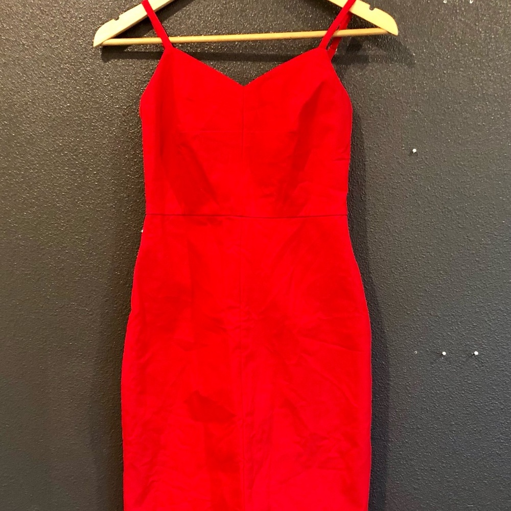Never worn tags on - Classy, quality red mini dress. Form fitting. S/XS